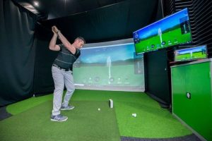 Golf simulators let you work on your swing whenever you want